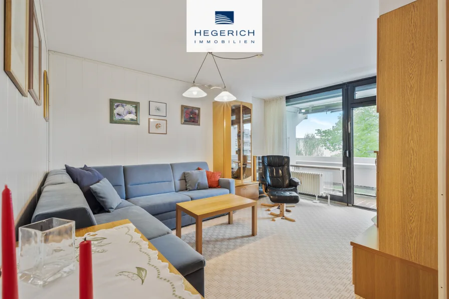 Wohnzimmer - Wohnung kaufen in München - HEGERICH: Perlacher Wohntraum – Charmante 3-Zimmer-Wohnung mit ruhigem Balkon