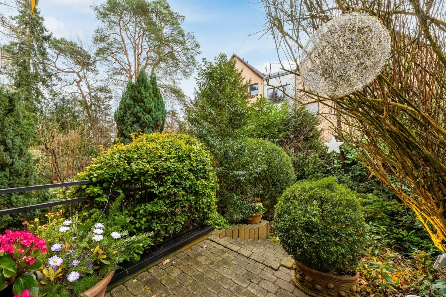 Garten - Wohnung kaufen in Schwaig bei Nürnberg - HEGERICH: Traumhafte Maisonette-Wohnung mit Garten, Terrasse und langfristigen Mietern