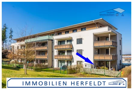 Schöne Erdgeschoss Wohnung - Wohnung kaufen in Traunreut - Sonnige, neuwertige 3-Zimmer-Gartenwohnung in begehrter Wohnlage für gehobene Ansprüche