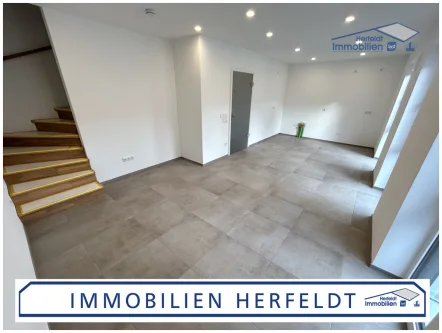 Modernes Ambiente - Wohnung kaufen in Kleinaitingen - Schicke 3,5-ZKB-Neubau-Wohnung über zwei Ebenen mit exklusiver Ausstattung - Erstbezug