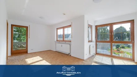 Wohnzimmer - Wohnung kaufen in Putzbrunn - Zum Selbstbezug - Apartment mit Südbalkon im Herzen von Putzbrunn!