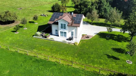 Vogelperspektive - Haus kaufen in Stemwede - Neu in Stemwede: Junges Einfamilienhaus mit Effizienzklasse A auf großzügigem Grundstück