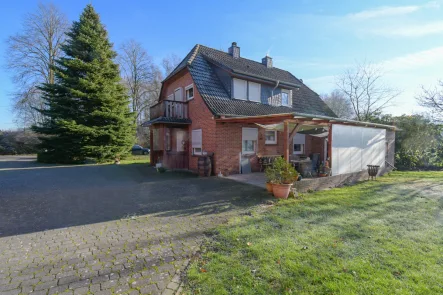 Ansicht - Haus kaufen in Wardenburg - 6248 - Preisreduzierung! Idyllisch gelegenes Wohnhaus mit Nebengebäude und ca. 1,3 ha Grünland.