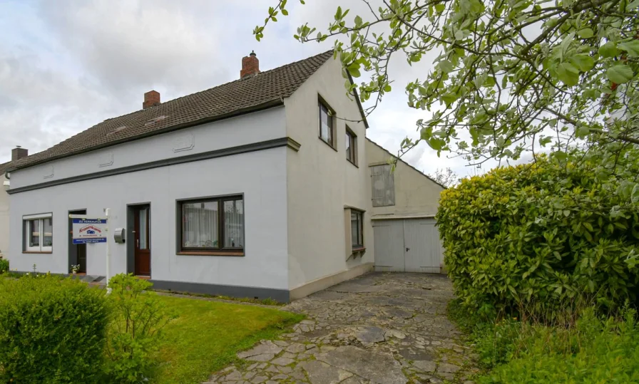 Ansicht - Haus kaufen in Sande - 6429 - VERKAUF gegen GEBOT - Doppelhaushälfte mit Charme, viel Platz und Sanierungspotenzial