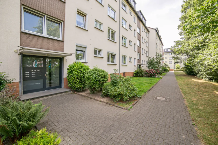 Außenansicht - Wohnung kaufen in Monheim am Rhein - Moderne 4-Zimmer-Dachgeschosswohnung mit Stellplatz in Monheim-Baumberg als Kapitalanlage