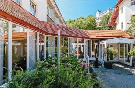 Hotelansicht - Wohnung kaufen in Aschau im Chiemgau - Die perfekte Ferienimmobilie im neu eröffneten Burghotel