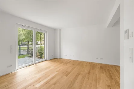 Wohnbereich - Wohnung kaufen in Bad Tölz - 2-Zimmer-Neubau-Wohnung mit herrlichem Privatgarten +++ SOFORT BEZIEHBAR +++ jetzt besichtigen