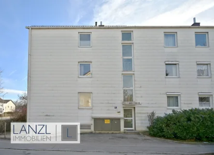 Hauseingang - Wohnung kaufen in Poing - Solide 3 Zi.-Etagenwohnung mit Süd-Balkon