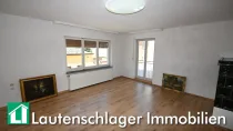 Wohnzimmer mit Kachelofen