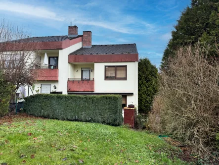 Außenansicht - Haus kaufen in Coburg - Vermietete Doppelhaushälfte im Coburger Stadtgebiet