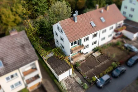 Luftansicht - Haus kaufen in Bad Mergentheim - Spannende Immobilie! Sanierungsbedürftiges Zweifamilienhaus direkt an der Tauber