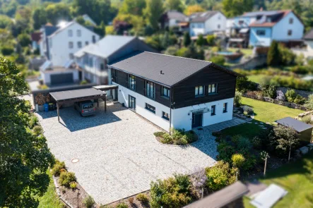 Aussenansicht - Haus kaufen in Winterhausen - Hochwertige und energieeffiziente Immobilie vereint modernes Wohnen und Arbeiten in sehr guter Lage