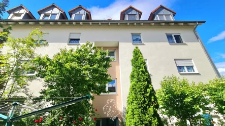 Gebäude-Ansicht - Wohnung kaufen in Knetzgau - Charmante Eigentumswohnung mit Balkon – Ihre Ruheoase in Knetzgau!