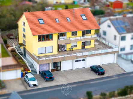 Grethe Schellmann Immobilien Rosengarten 40 Gaukönigshofen - DJI_20250111131517_0398_D - Haus kaufen in Gaukönigshofen - Top gepflegtes Mehrfamilienhaus mit vielseitiger Gewerbeeinheit