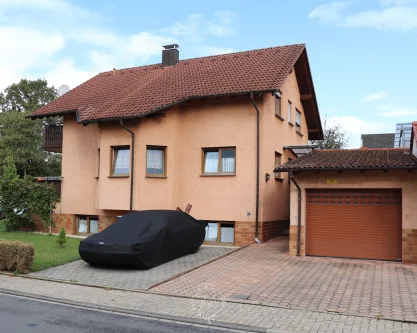 Hausansicht - Haus kaufen in Bad Rappenau / Grombach - Facettenreiches Zweifamilienhaus in Grombach