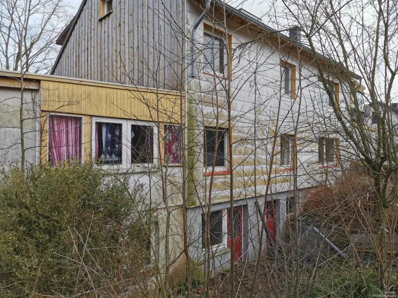 Seitenansicht - Haus kaufen in Spenge - Mehrfamilienhaus in südl. Lenzinghausen