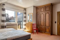 Das Schlafzimmer mit dem Balkon