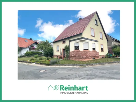 Titelbild - Haus kaufen in Wertheim / Höhefeld - Wohnen in ruhiger Ortsrandlage