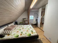 Wohnung 4 - Schlafzimmer