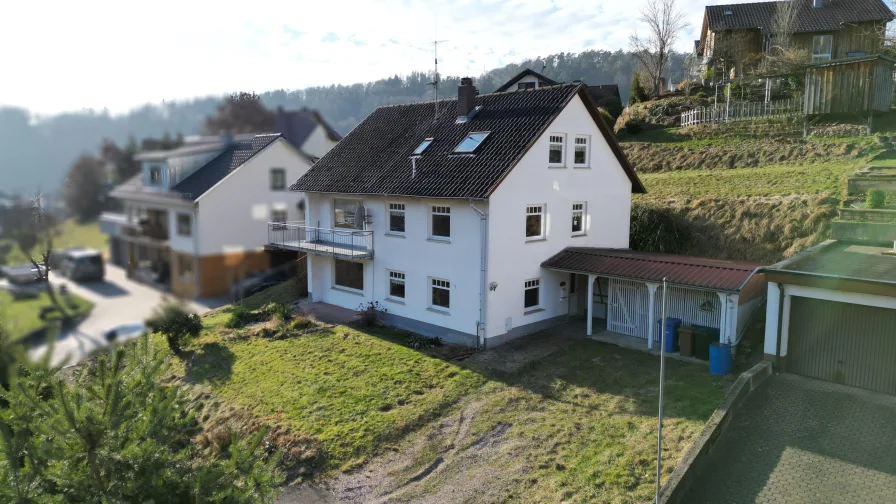 Luftaufnahme - Haus kaufen in Partenstein - Ruhig und Naturnah -  Entkertnes Einfamilienhaus in Partenstein