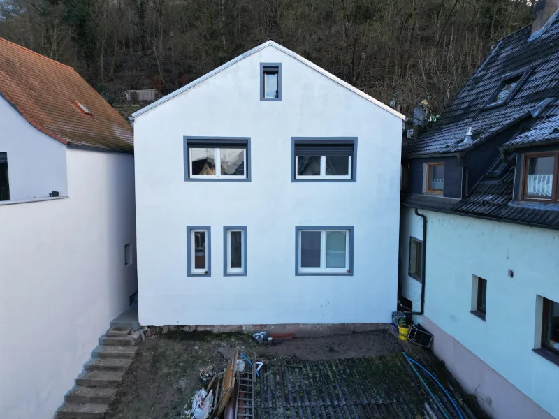 Außenansicht - Haus kaufen in Gemünden - Charmantes Einfamilienhaus mit Altstadtblick und großzügigen Terrassenflächen