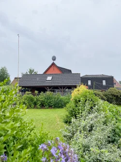 Vorderansicht - Haus kaufen in Drochtersen / Dornbusch - Handwerker aufgepasst! Einfamilienhaus mit Wintergarten und Nebengebäude