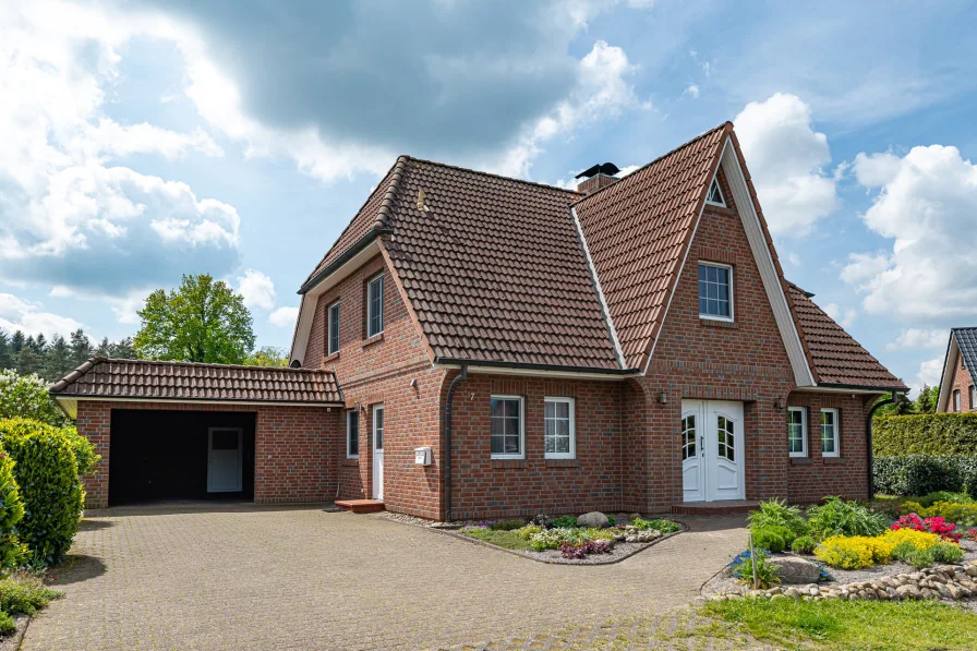 Herzlich Willkommen! - Haus kaufen in Hechthausen - Familienglück in idyllischer Umgebung!