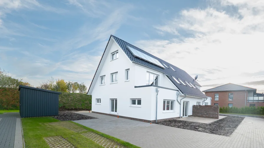 Außenanischt - Haus mieten in Hemmoor - Elegantes Wohnen im Mehrfamilienhaus: 3-Zimmer-Wohnung im Obergeschoss links - Am Wohnpark Hamfeld