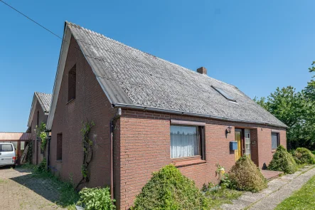 Außenansicht - Wohnung kaufen in Oberndorf - Tolle Doppelhaushälfte bzw. Wohnung inmitten der Natur!