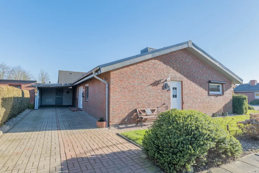 Außenansicht  - Haus kaufen in Freiburg (Elbe) - Gemütlicher Bungalow aus 1978 – Ihr perfektes Zuhause in ruhiger Lage