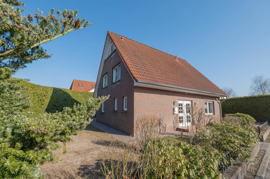 Außenansicht - Haus mieten in Stade - Einfamilienhaus in ruhiger Sackgassenlage – mit Carport, Garten und viel Platz zum Wohlfühlen!