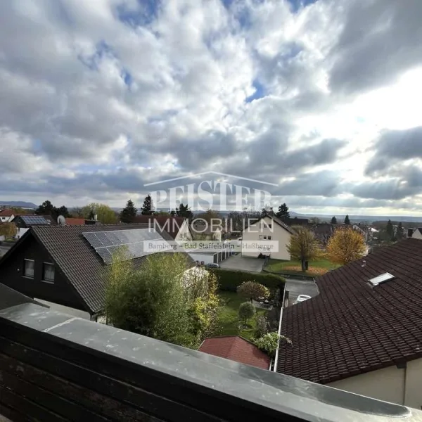 Ausblick - Wohnung kaufen in Haßfurt - Blick über Haßfurt - Gemütliche 3-Zimmer-Dachgeschosswohnung in ruhiger Ortsrandlage