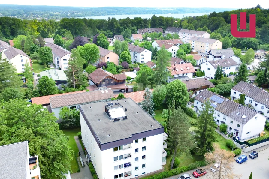 Luftansicht - Wohnung kaufen in Starnberg - WINDISCH IMMOBILIEN: Vermietete Dreizimmer Wohnung in Ortsrandlage von Starnberg