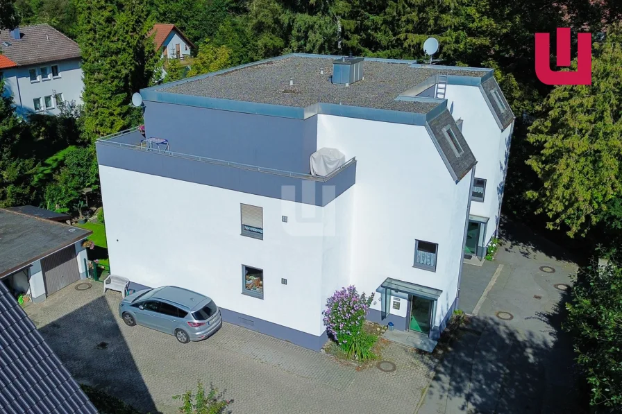 Luftansicht - Wohnung kaufen in Gröbenzell - WINDISCH IMMOBILIEN - Attraktive Wohnung mit großer Dachterrasse am Ortsrand von Gröbenzell.