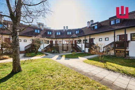 Außenansicht - Wohnung kaufen in Gröbenzell - WINDISCH IMMOBILIEN - Attraktive 4-Zi. Maisonette-Wohnung in bester Lage von Gröbenzell!