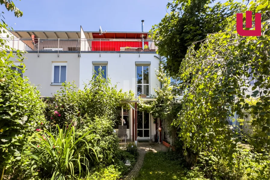 Gartenansicht - Haus kaufen in Fürstenfeldbruck - WINDISCH IMMOBILIEN - Gepflegtes 5-Zi-RMH mit EBK & Dachterrasse in familienfreundlicher Lage v. FFB