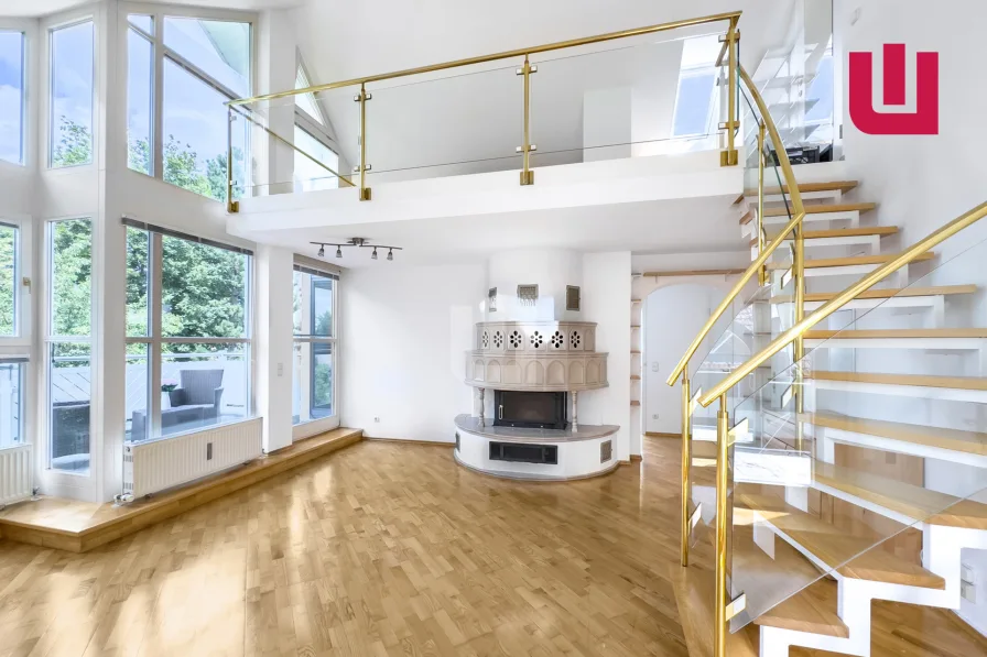 Wohnzimmer - Wohnung kaufen in München - WINDISCH IMMOBILIEN - Schicke 2-Zi. Wohnung mit Galerie und Süd-West Dachterrasse in Fürstenried