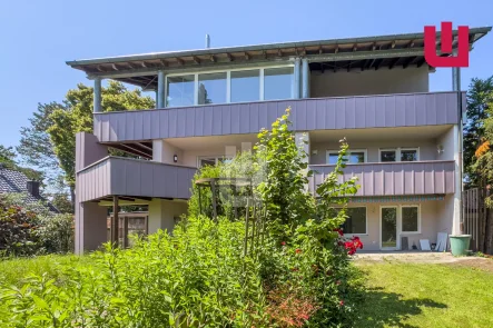 Außenansicht - Haus kaufen in Gröbenzell - WINDISCH - Modern saniertes Mehrfamilienhaus in grüner Lage von Gröbenzell-Nord - frei ab sofort!