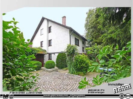 Terrasse EG - Haus kaufen in Erlangen-Tennenlohe - Wohnhaus mit 3 Wohnungen