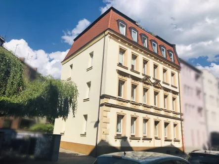 Ansicht - Wohnung kaufen in Nürnberg - Gemütliche und vermietet - 2-Zimmer-Erdgeschosswohnung mit Balkon