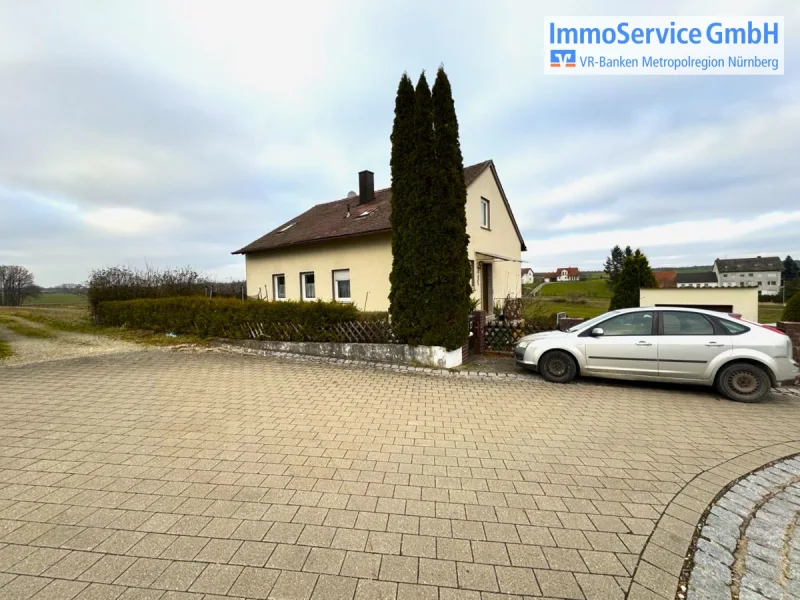 Titelbild - Haus kaufen in Herzogenaurach / Welkenbach - Einfamilienhaus mit viel Potenzial