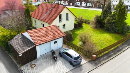 Außenansicht - Haus kaufen in Schongau - Familienfreundliche Lage - Einfamilienhaus mit sonnigem Grundstück!