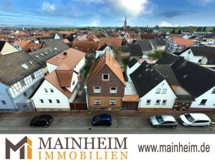 Willkommen in Schaafheim - Haus kaufen in Schaafheim - Vielseitiges Mehrgenerationshaus mit Einliegerwohnung und Wohlfühl-Atmosphäre