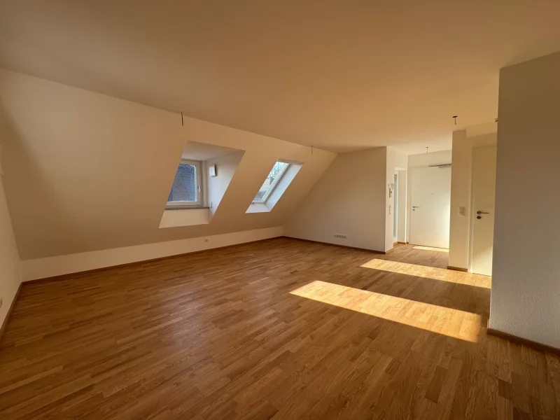 Wohnzimmer - Wohnung kaufen in Dachau - Exklusive Dachgeschosswohnung mit Penthouse-Flair und zusätzlichem Atelierbereich, Erstbezug!