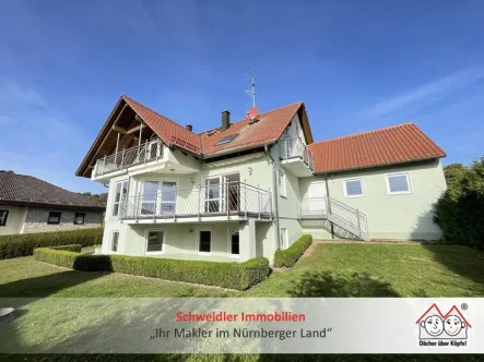 Hausansicht  - Haus kaufen in Neunkirchen - Schmuckstück am Land!!! TOP gepflegtes Familienanwesen mit ELW, 5 Balkonen & DoGa in Neunkirchen-OT