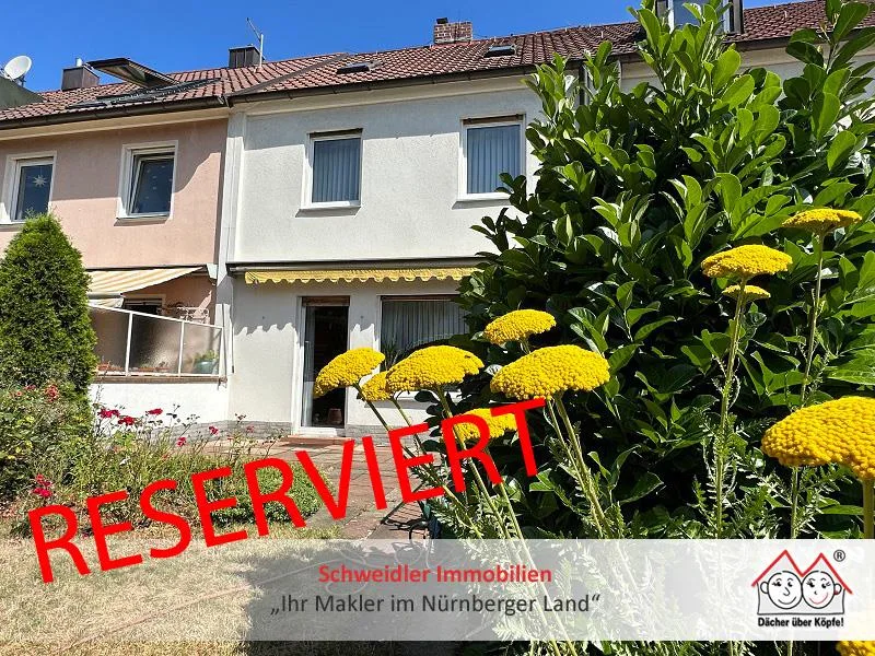 Gartenansicht - Haus kaufen in Nürnberg - Einfach Zuhause! Gepflegtes Familien-Reihenmittelhaus mit Garage in Nürnberg-Thon