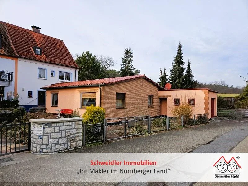 Außenansicht Bild 1 - Haus kaufen in Neunkirchen - Gelegenheit! 2 Häuser zum Preis von einem! Sanierungsbedürftige DHH + renov. Bungalow in Neunkirchen