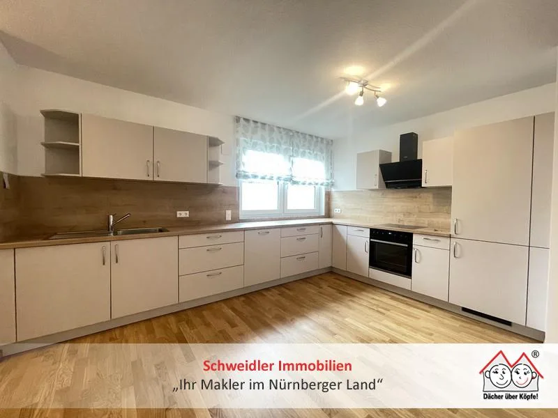 Wohnküche - Wohnung kaufen in Lauf - Garten in der City! 2-Zimmer-Eigentumswohnung mit EBK, Garten & Tiefgaragenstellplatz in Lauf 