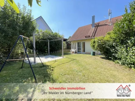 Garten - Wohnung kaufen in Lauf - Einzigartig! Haus-in-Haus-Eigentumswohnung mit idyllischem Garten in Lauf-Neunhof zum Kauf