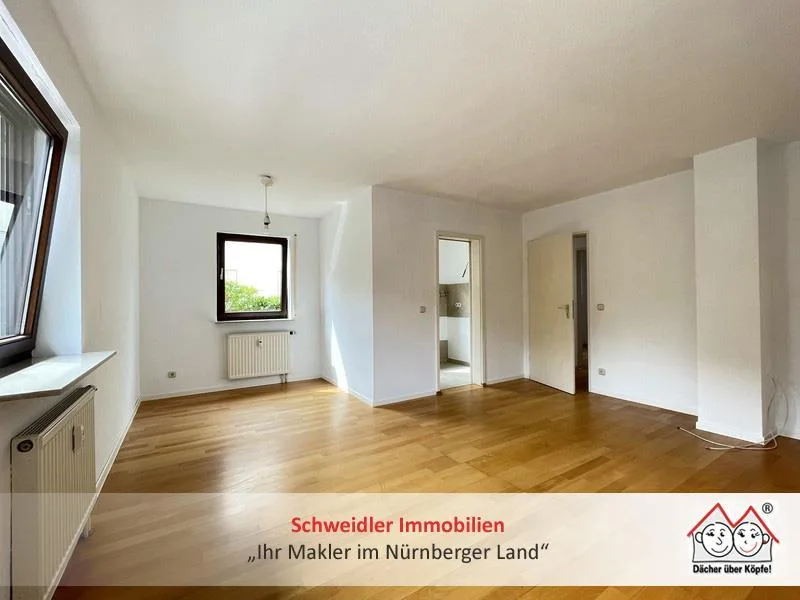 Wohnzimmer - Wohnung kaufen in Nürnberg - Entspannt leben am See: 2-Zimmer-Erdgeschoss-Wohnung mit Stellplatz am Wöhrder See in Nürnberg